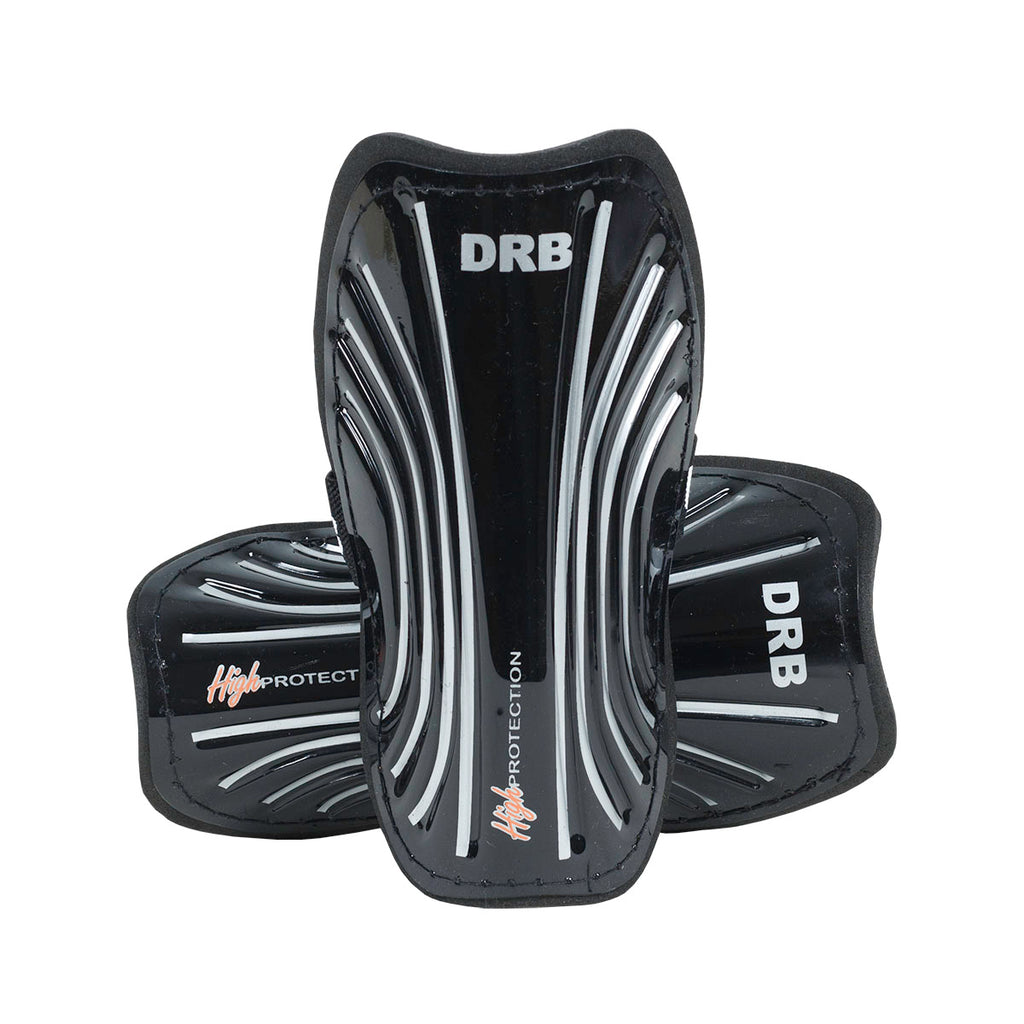 Canilleras Drb High Manchester Adulto